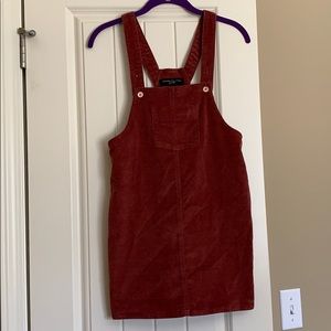 Overall dress with pocket in the front